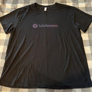 Lululemon Size 8 Black All Yours Tee. Comes with tag. Used but no flaws.